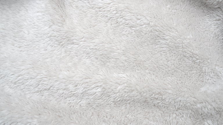 Textured soft carpet fibers