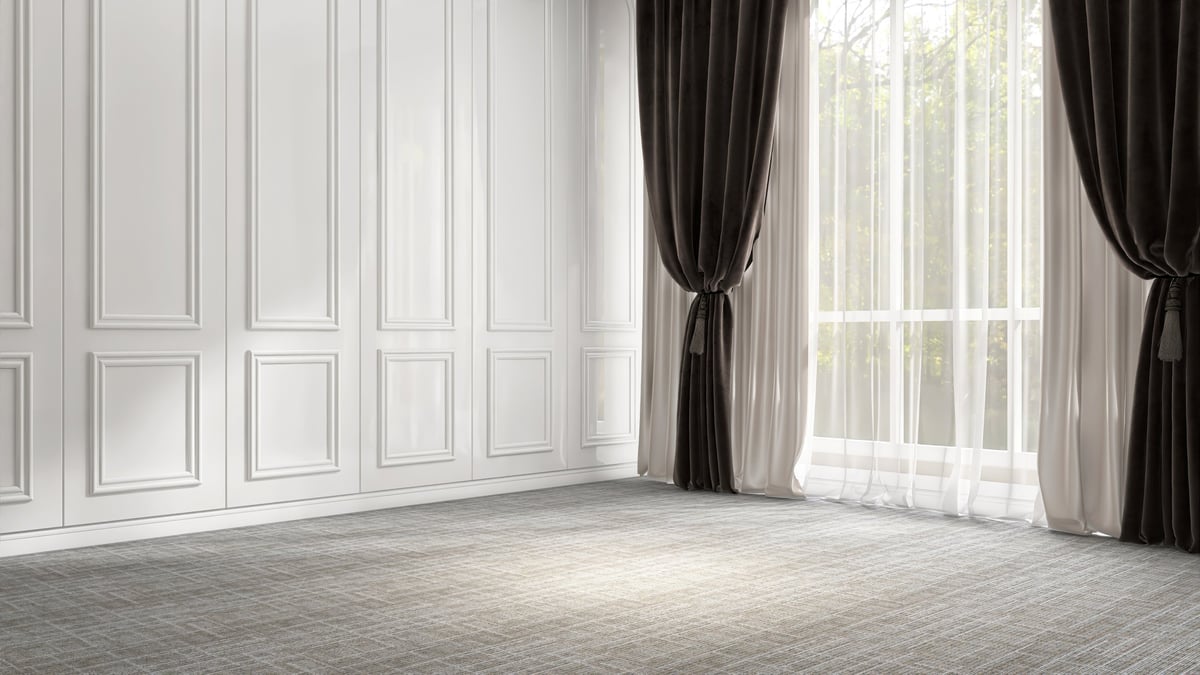 Empty room with gray carpet floor ready for staging